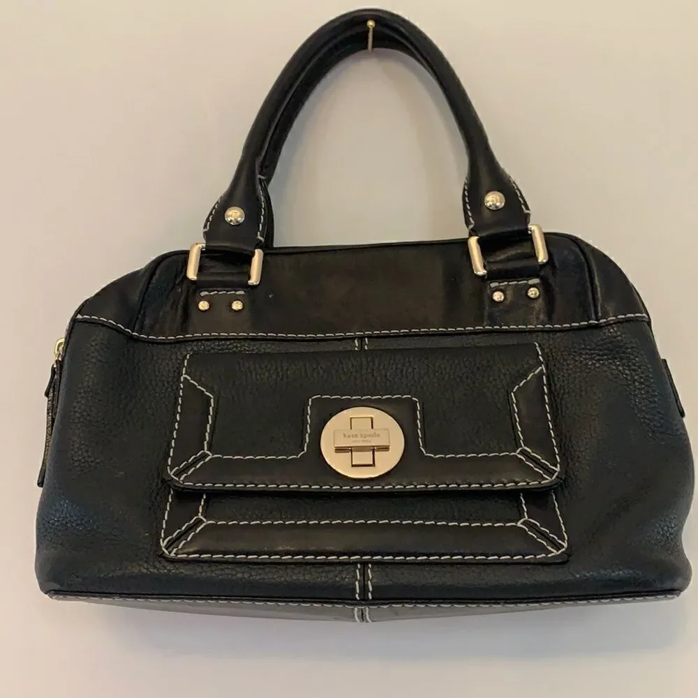Kate Spade ♠️ mini black leather satchel with gold clasp closure. L 12” H 8”
